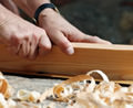 Carpenter cutting wood